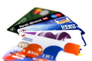 debit cards and credit cards. CSUEB grad  Rueben Rodriguez  says to use debit cards when shopping on Cyber Monday.